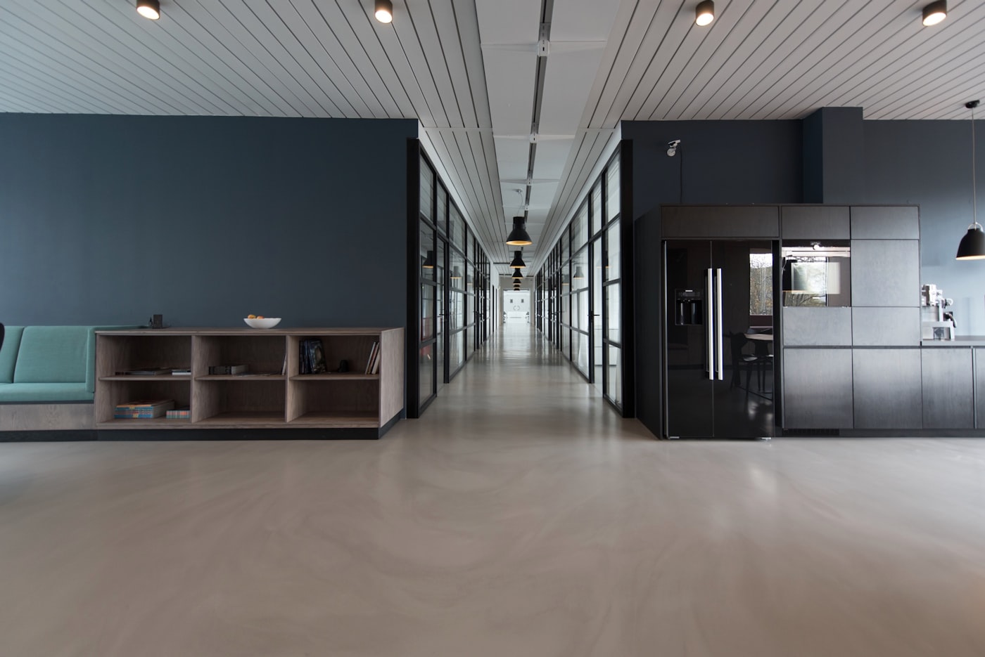 Modern New York office hallway with navy walls